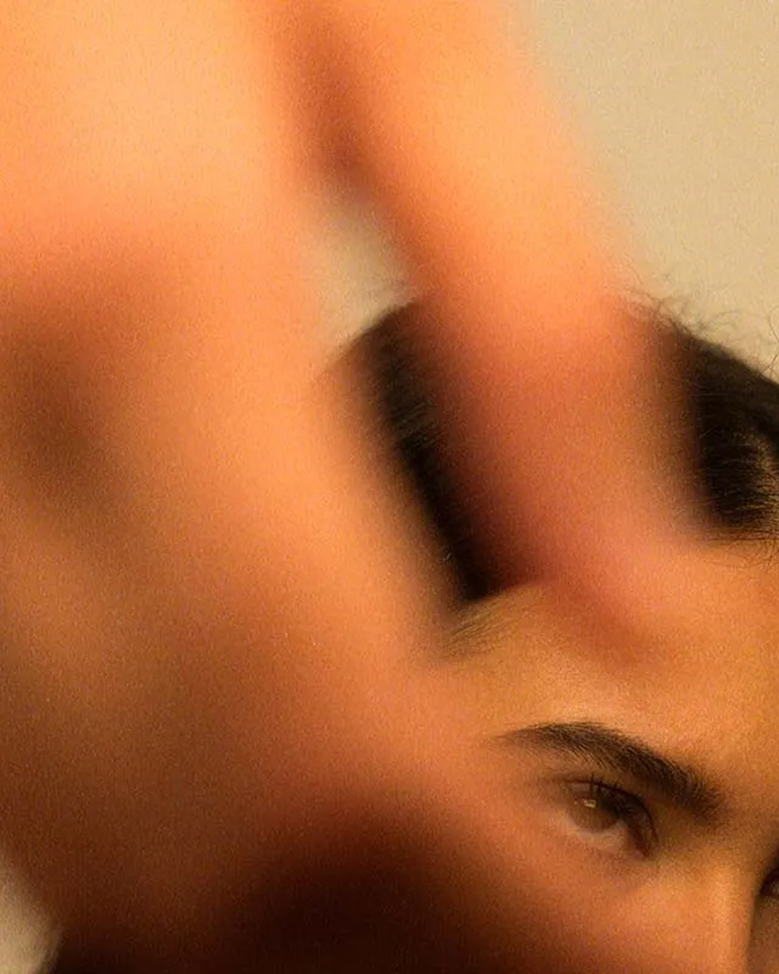 A photography shoot of a women looking at the lens