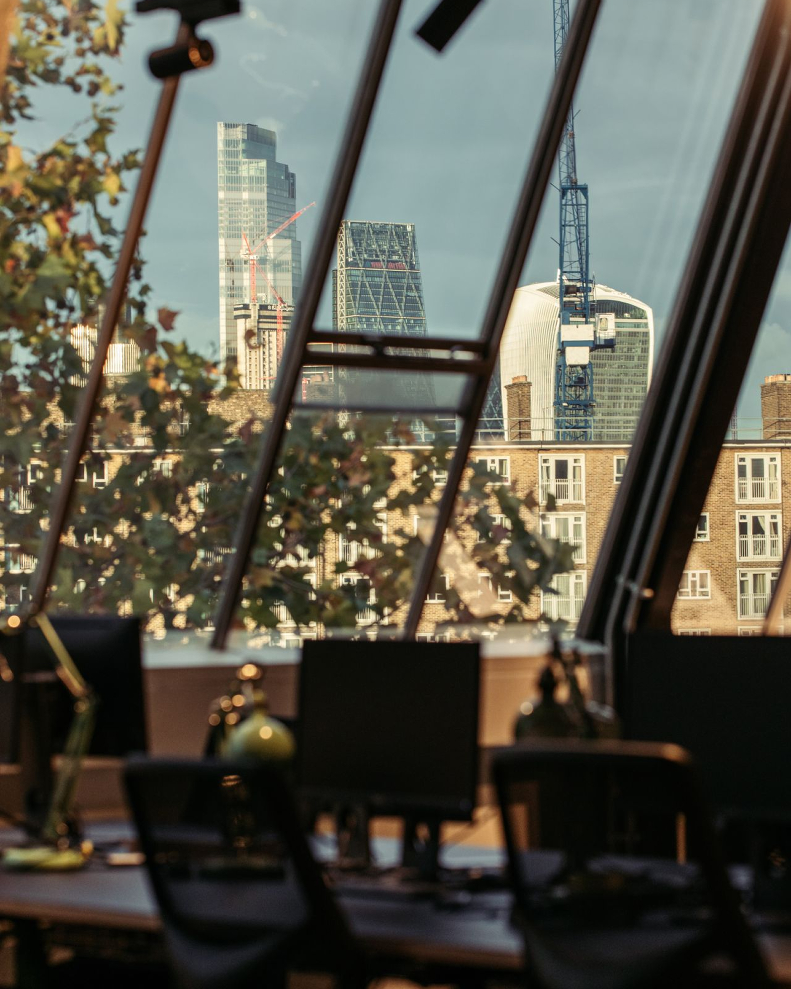 A image of the london skyline through a office window